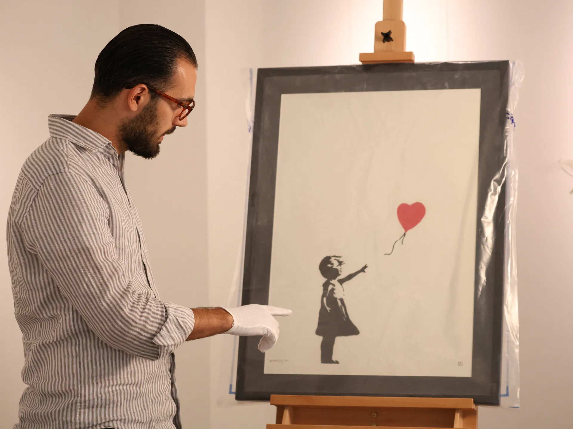 Man jailed for ‘smash and grab’ theft of Banksy’s Girl with Balloon print | Arts and Culture News
