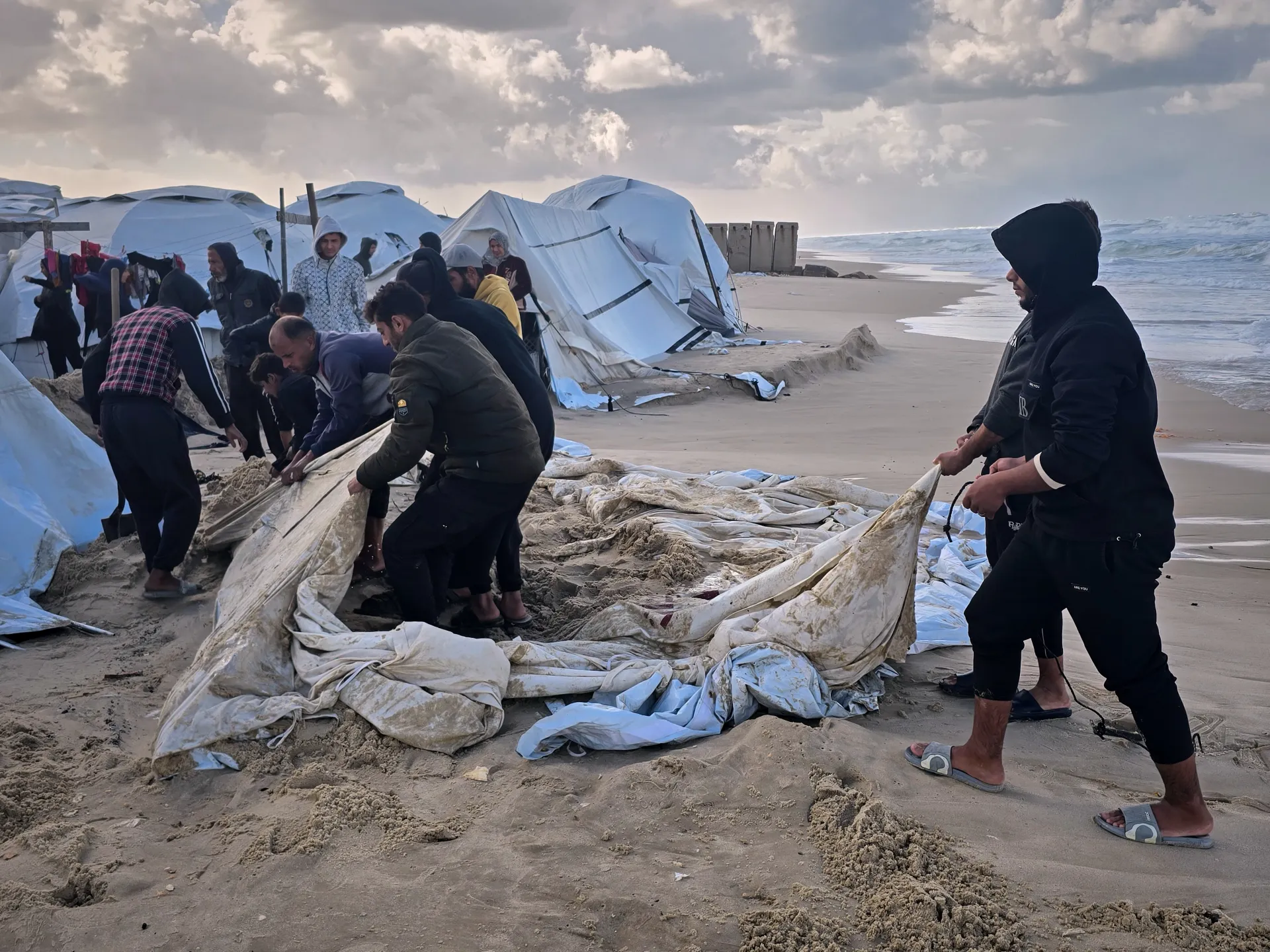 Winter floods wreak havoc on Gaza displacement camps as Israel blocks aid | Gaza News